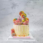 Load image into Gallery viewer, Candy drip cake 9
